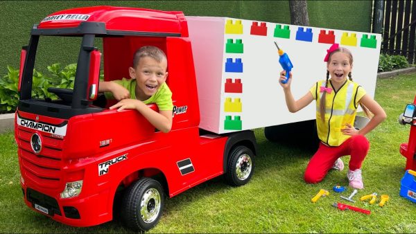Sofia and Max play with a Red Toy Truck