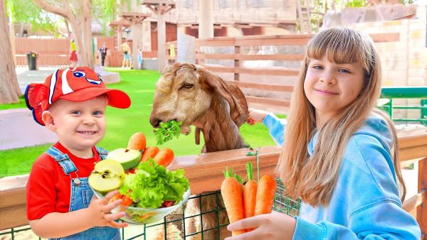 Diana Roma & Oliver feed the Animals at the Emirates Park Zoo